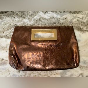 Michael Kors metallic/ gold clutch bag.